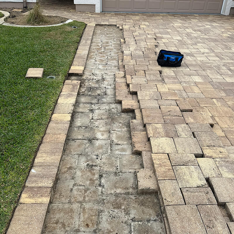 A paver walkway repair in progress, one of Easy Peasy's real completed jobs